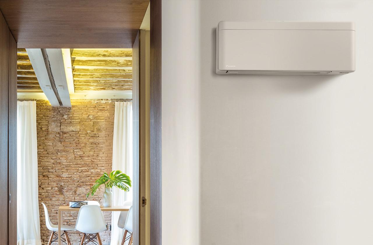 Wall-mounted air conditioning unit in a modern interior