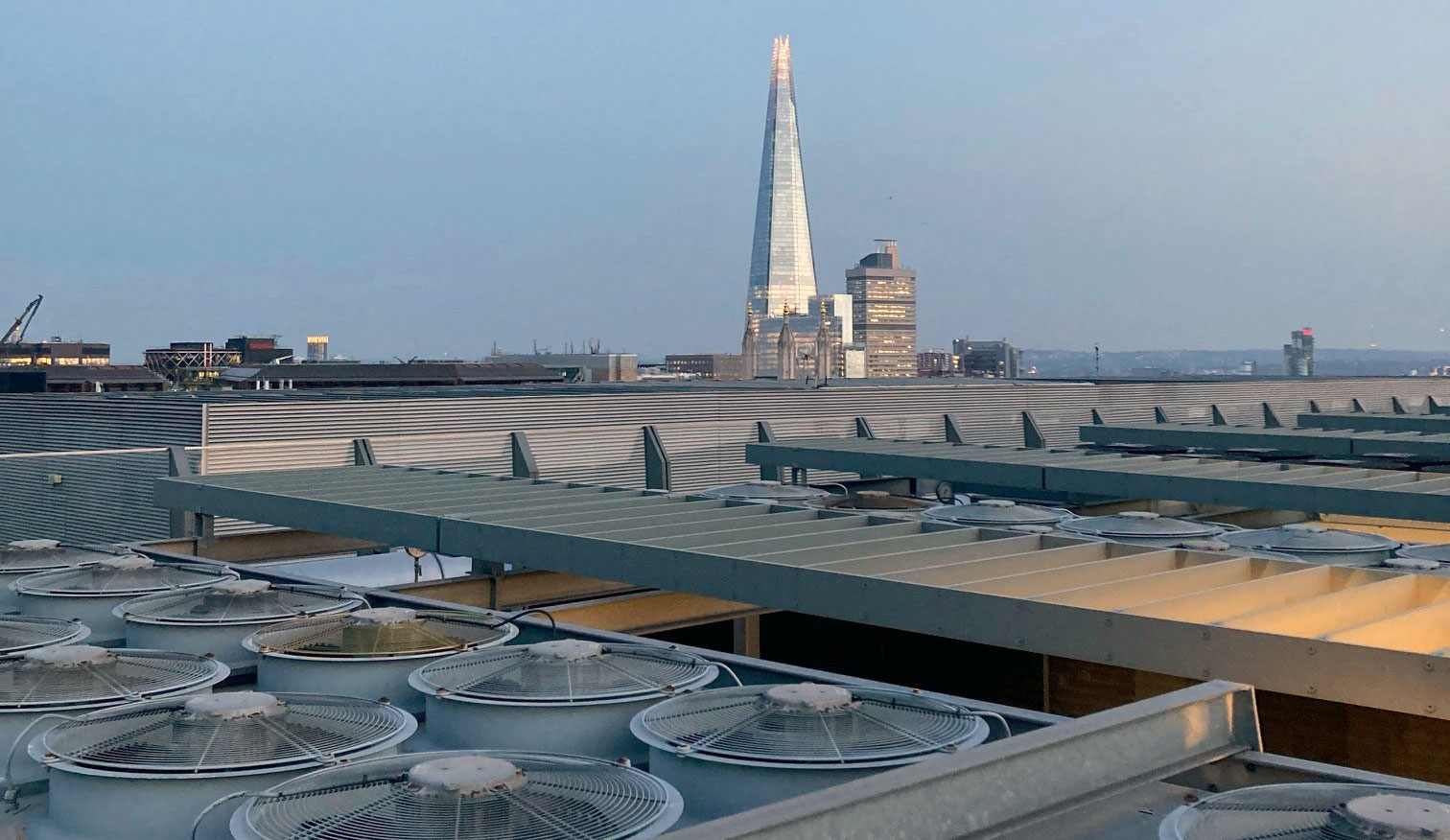 Commercial rooftop air conditioning installation overlooking London